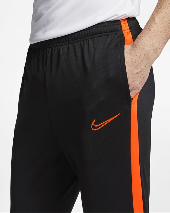 pantaloni nike arancioni