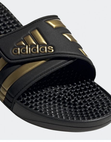 Ciabatte Adidas ADISSAGE unisex mare piscina nuoto tempo libero gomma Nero oro - Adidas ADISSAGE unisex beach slippers swimming pool leisure rubber Black gold - Adidas ADISSAGE chaussons de plage unisexe piscine loisirs caoutchouc Noir or - Adidas ADISSAGE Unisex Strandpantoffeln Schwimmbad Freizeit Gummi Schwarz Gold